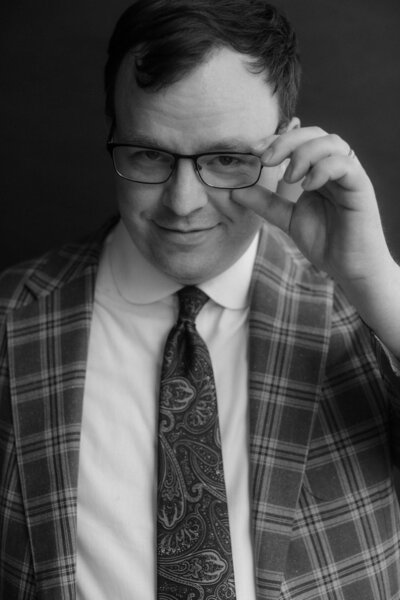 Client portrait in a Sew Generously bespoke suit